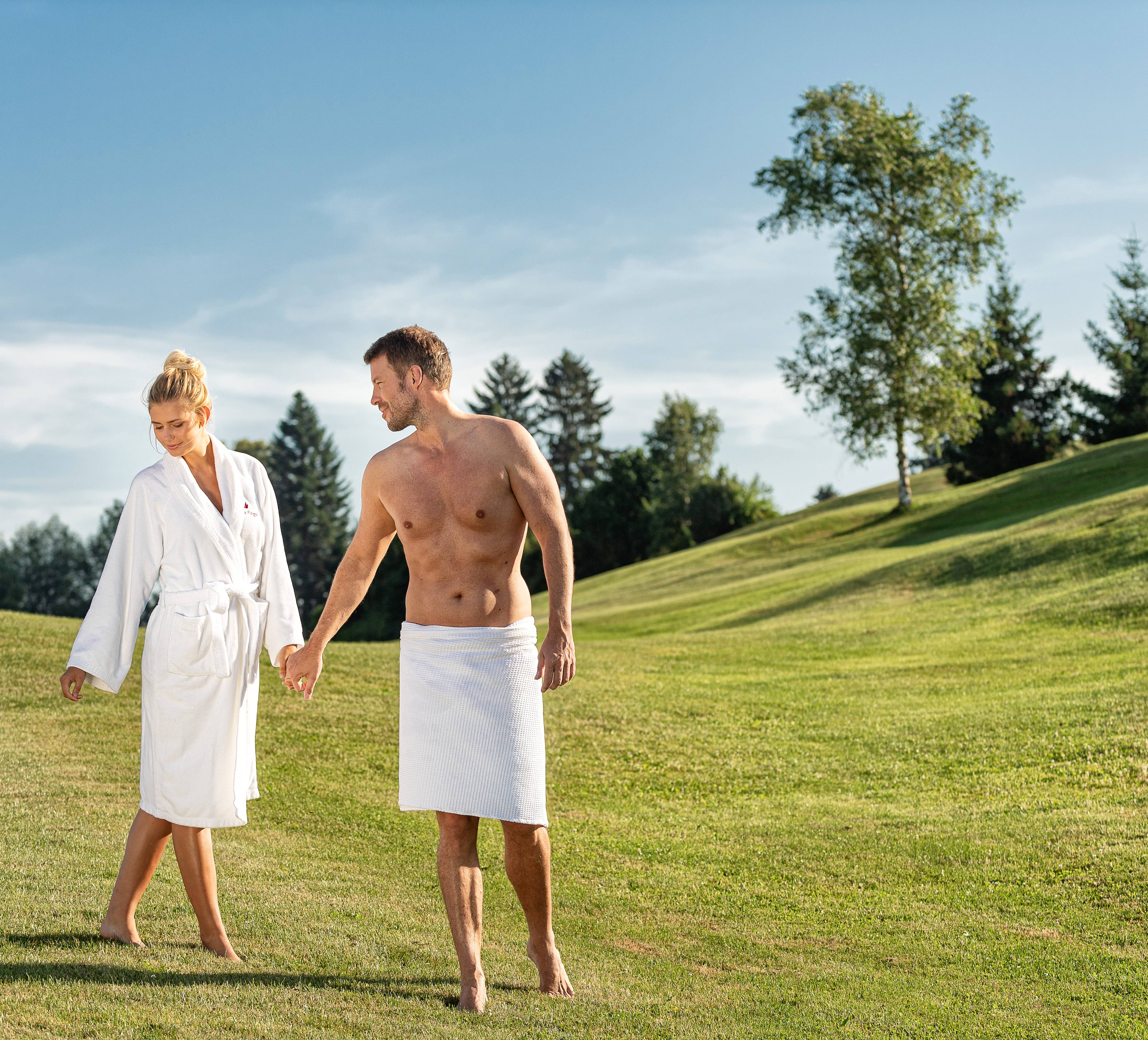 Couple in the garden wellness holiday hotel Dein Engel