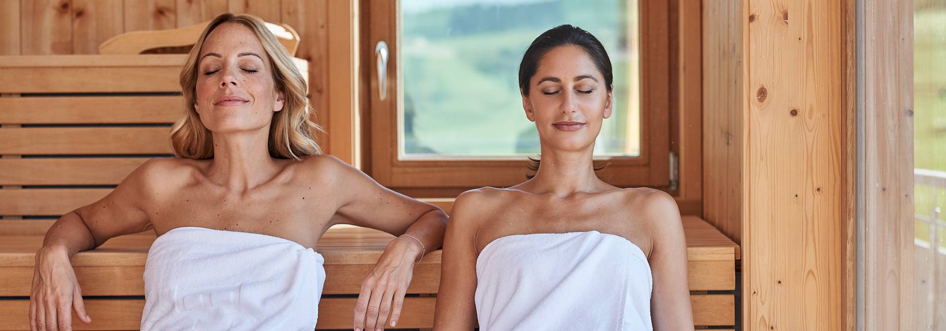 relaxing women in the panorama sauna at Dein Engel